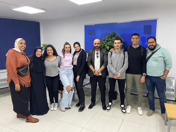 A group of English learners together in a classroom